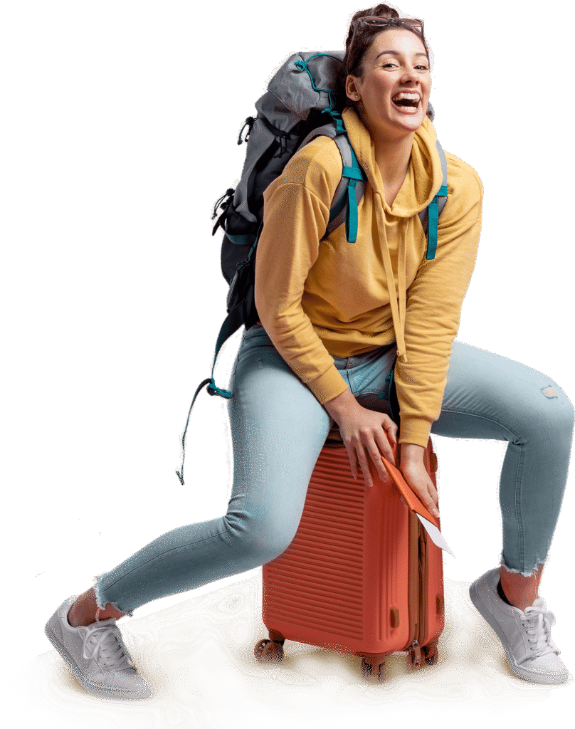 laughing woman with travelling luggage