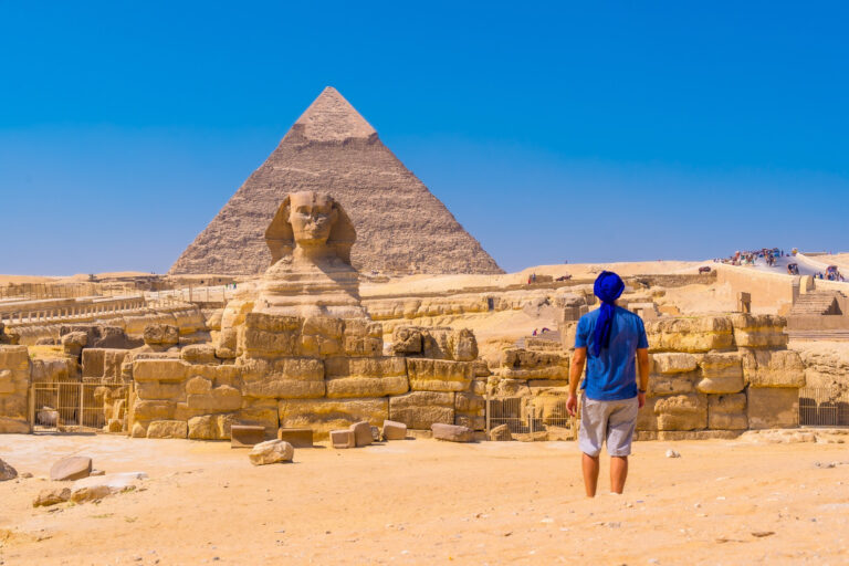 man looking at the pyramid in egypt