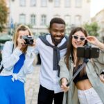 young-traveling-people-having-fun-and-sightseeing-in-city-multiethnic-friends-posing-together-e1649177405810